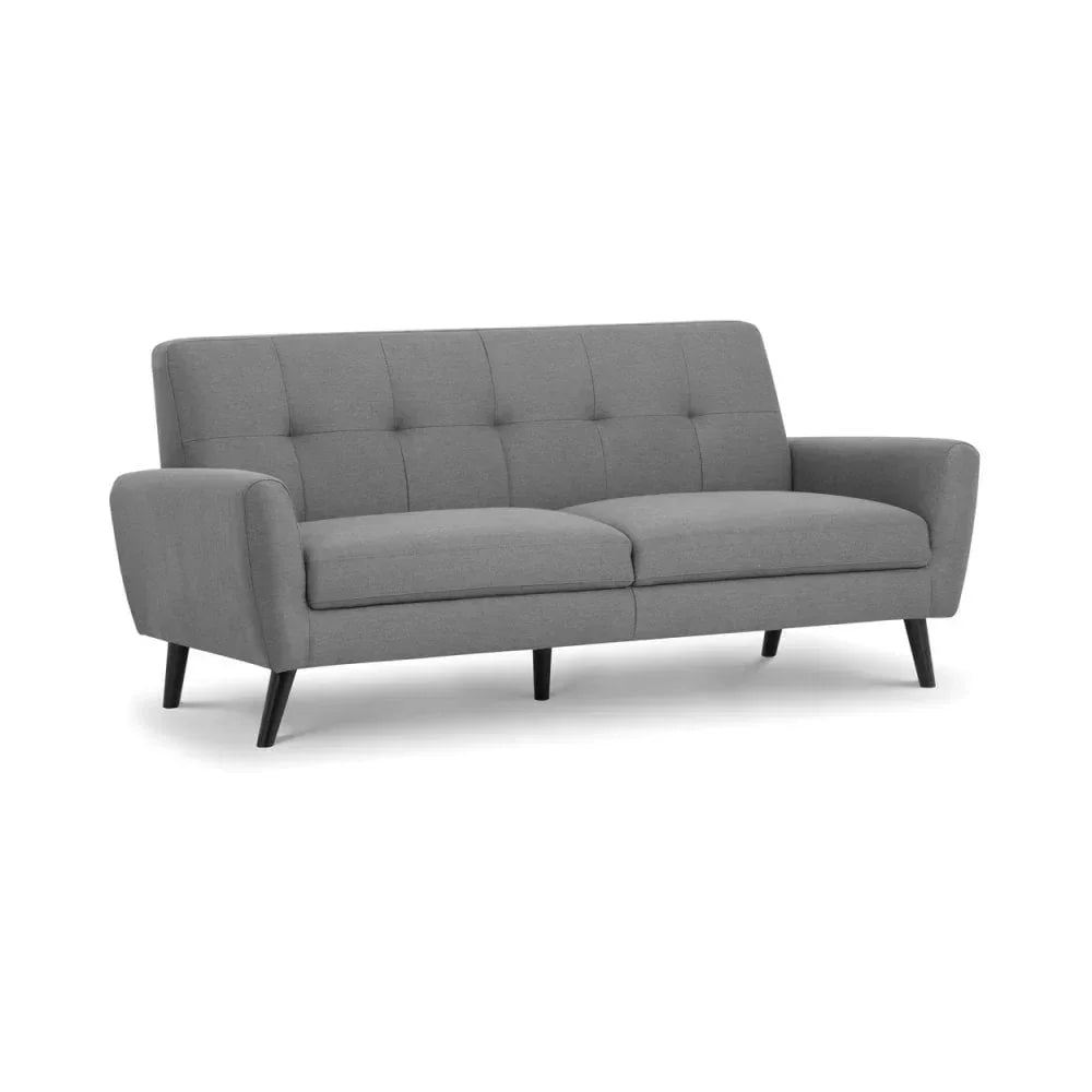 Grey fabric sofa with tufted backrest and angled black legs on white background