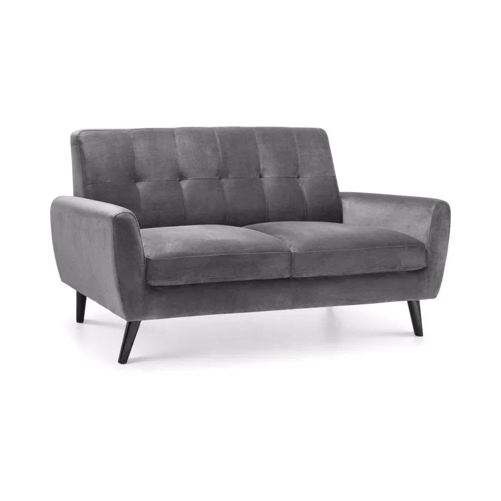 Grey velvet two seater sofa with button tufted backrest and angled wooden legs