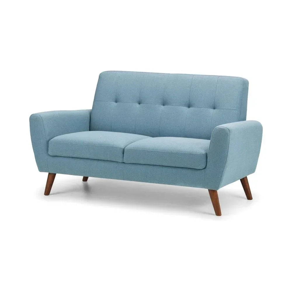 Light blue fabric sofa with wooden legs and button-tufted backrest, angled front view