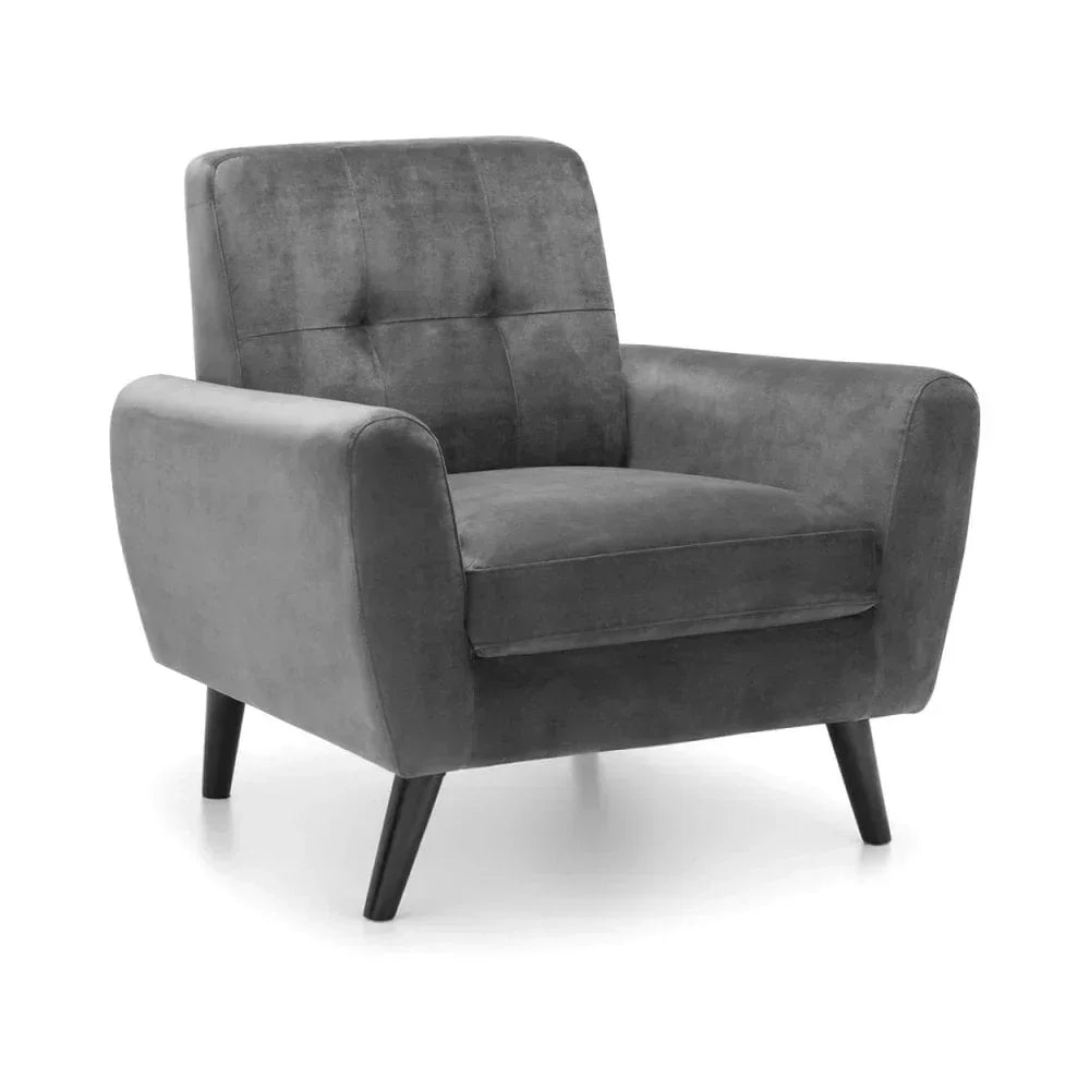 Grey fabric armchair with tufted backrest and angled wooden legs