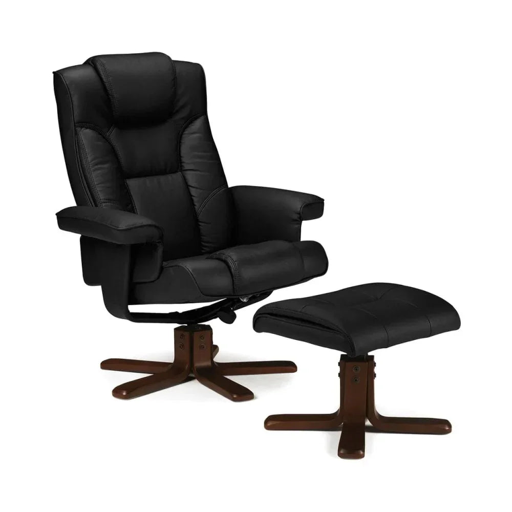 Black leather recliner chair with padded armrests and matching footstool on wooden bases