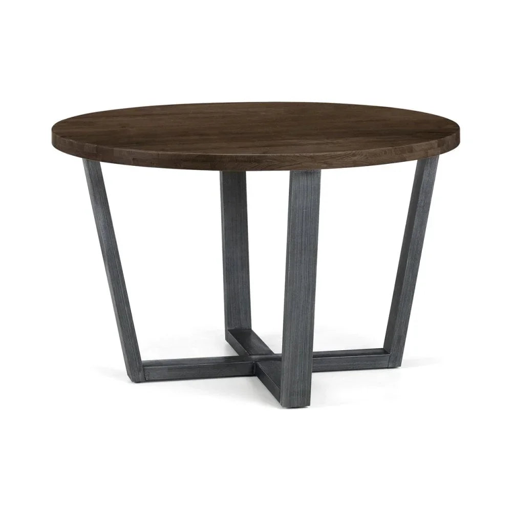 Round dining table with dark wood top and angled metal legs