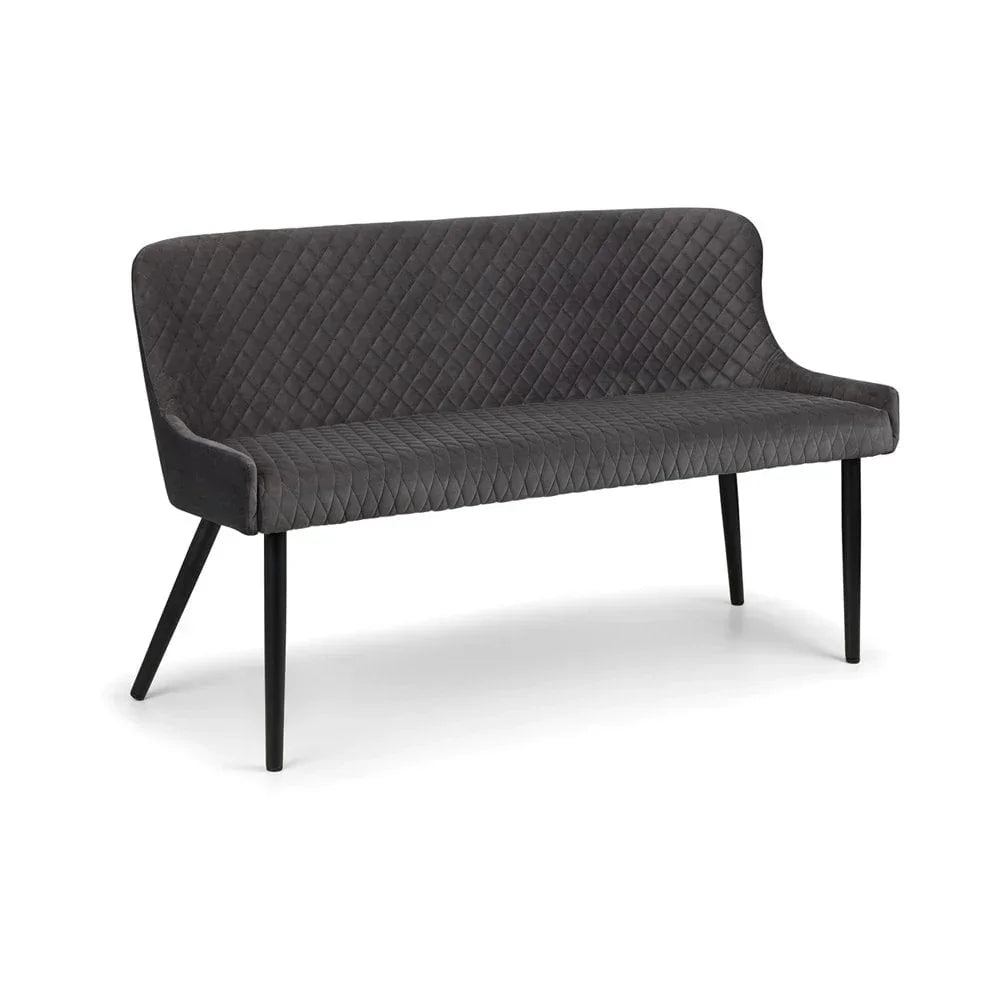 Dark grey quilted fabric dining bench with black tapered legs on white background