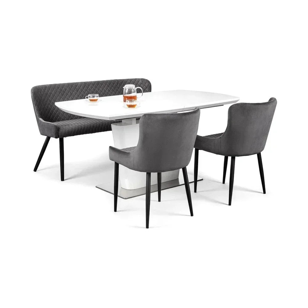 Modern dining table with white gloss finish, grey upholstered bench and two chairs