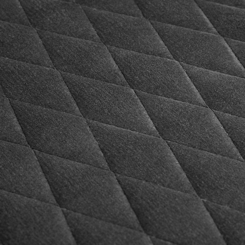 Diamond quilted dark grey fabric upholstery close-up for furniture