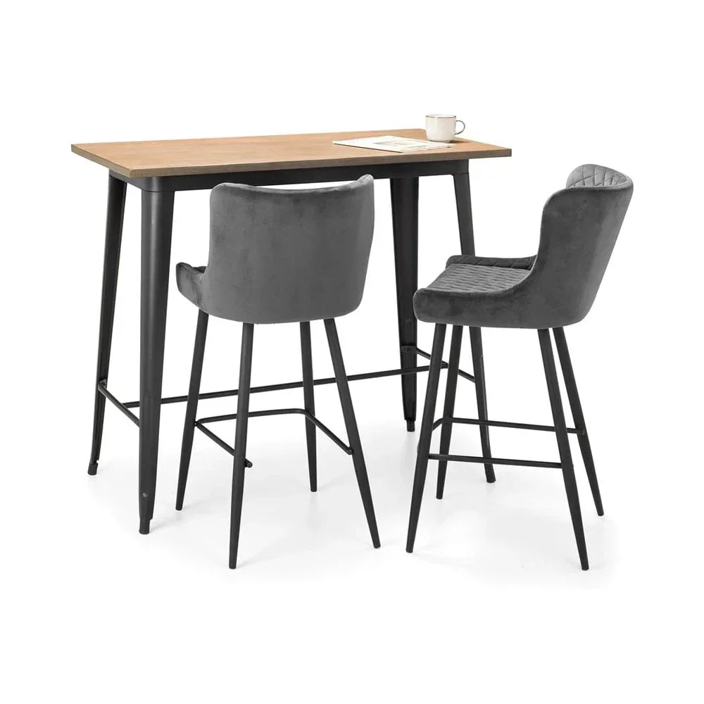 Bar table set with wooden top and two grey velvet bar stools on black metal legs