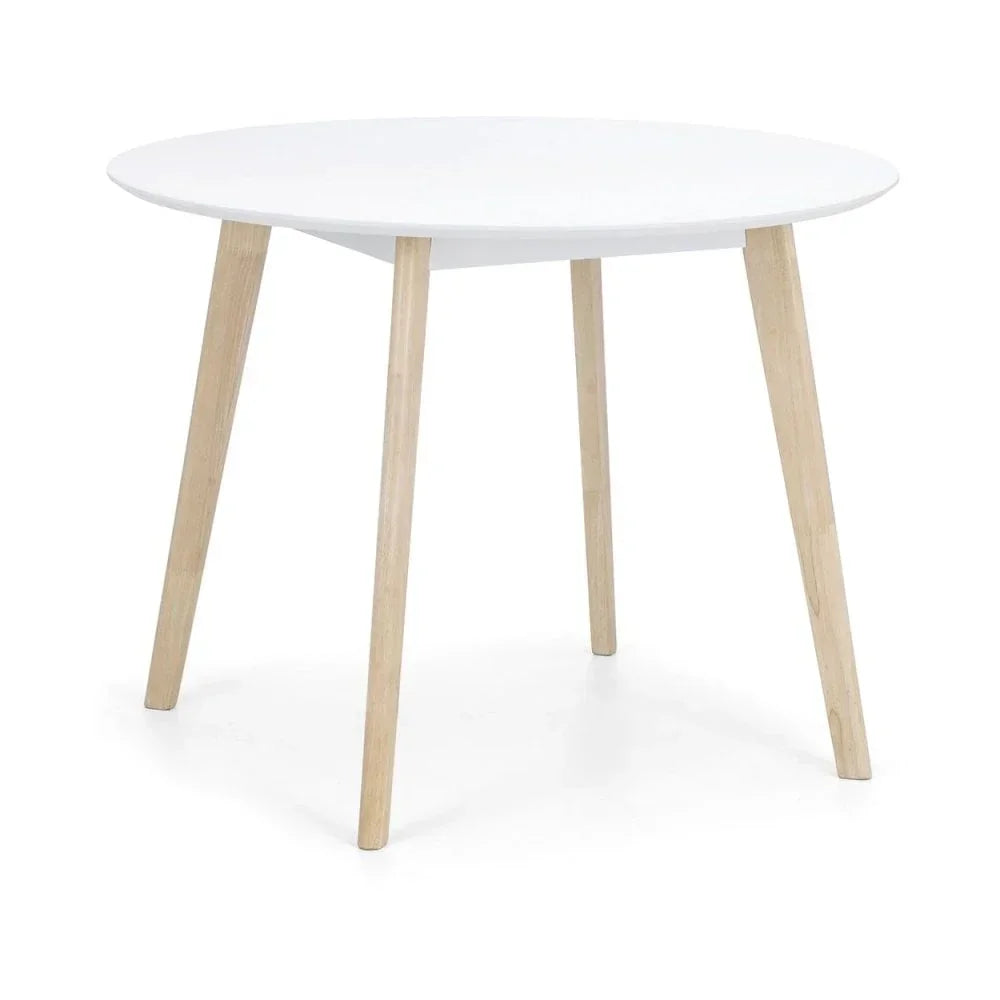 Round white dining table with natural wood legs on white background