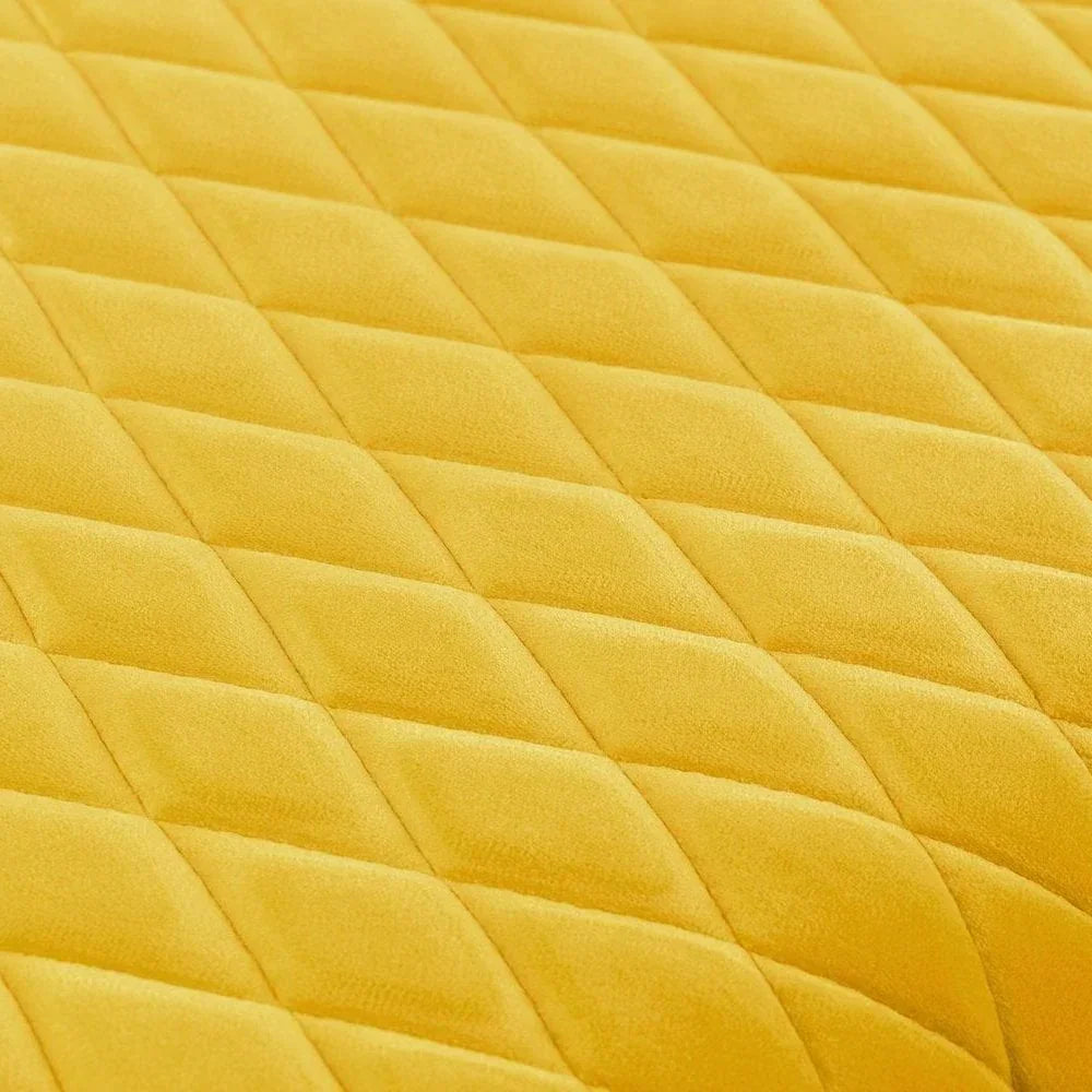 Yellow quilted fabric upholstery with diamond pattern texture