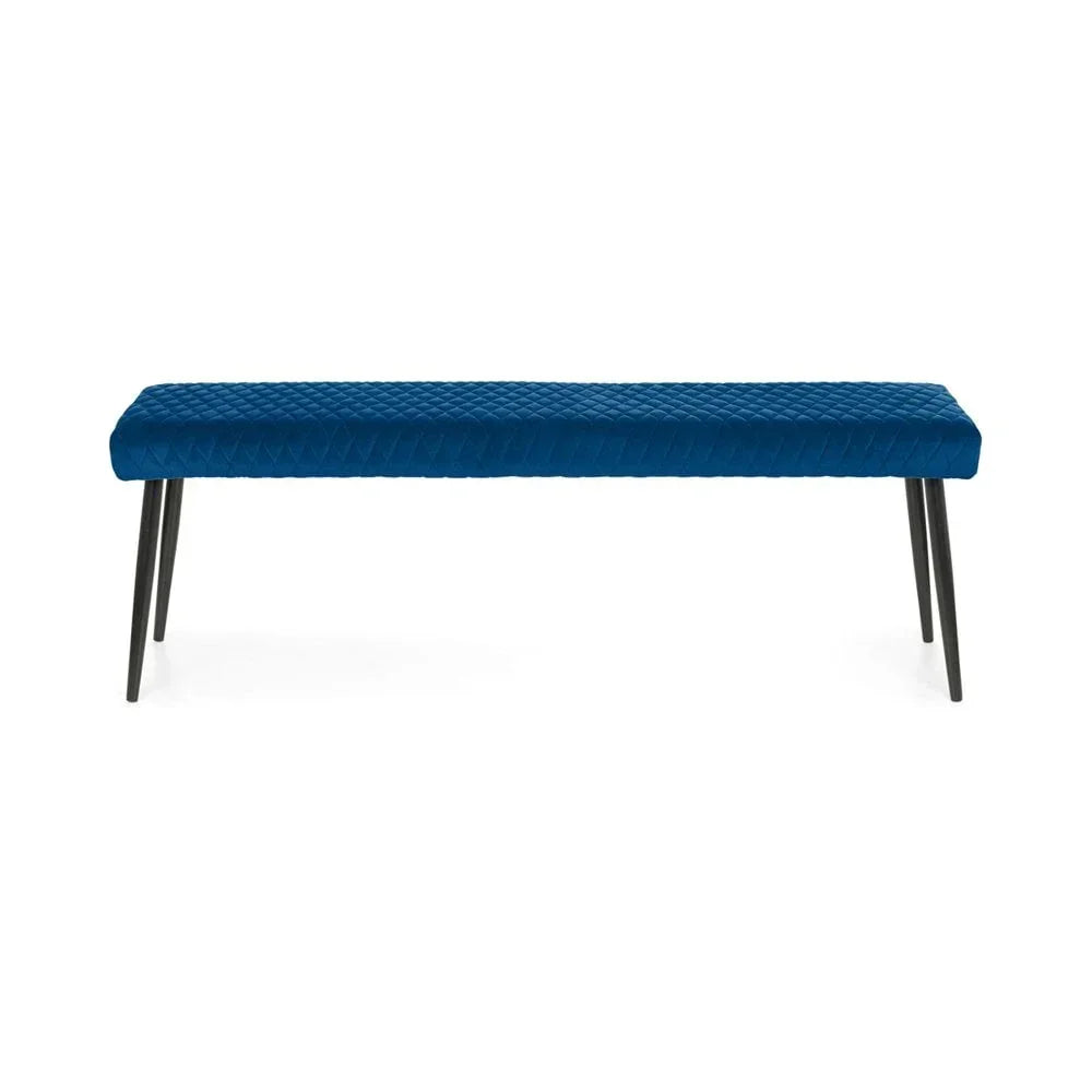 Blue velvet dining bench with quilted seat and black metal legs, front view