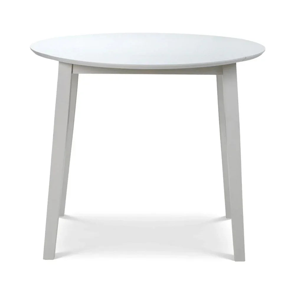 White round dining table with angled wooden legs, modern minimalist style