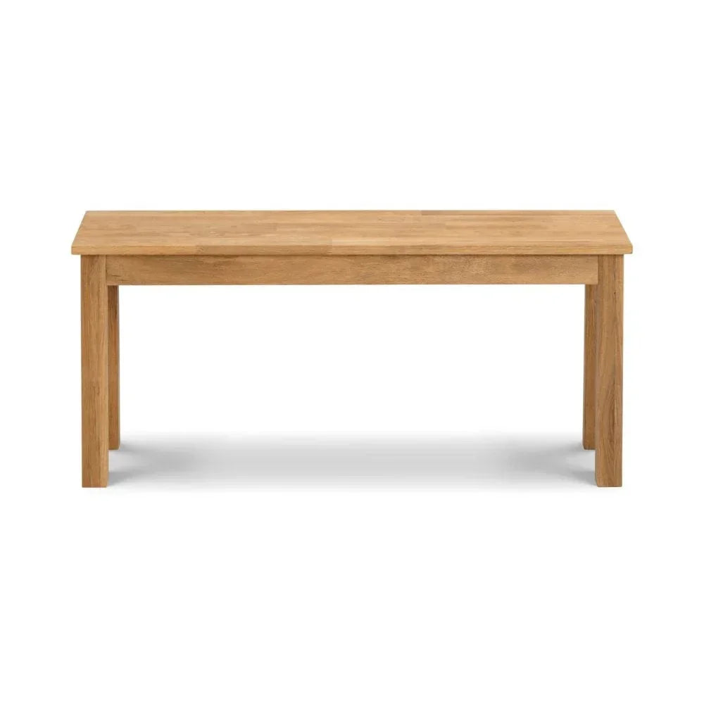 Rectangular oak dining table with straight legs on a white background