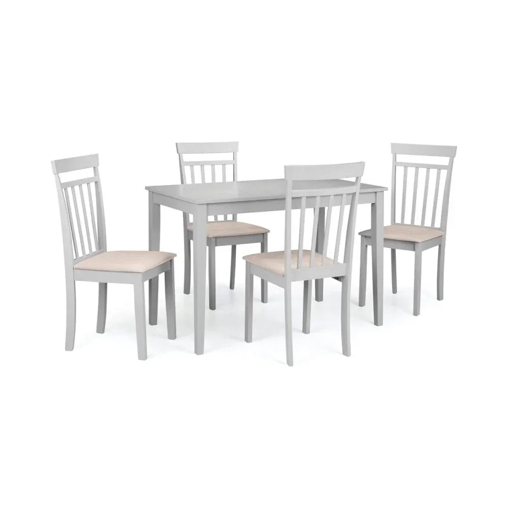 Light grey dining table set with four matching chairs and beige upholstered seats