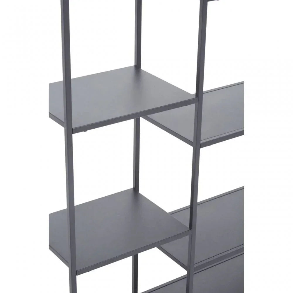 Close up of modern black metal bookshelf with open square shelves