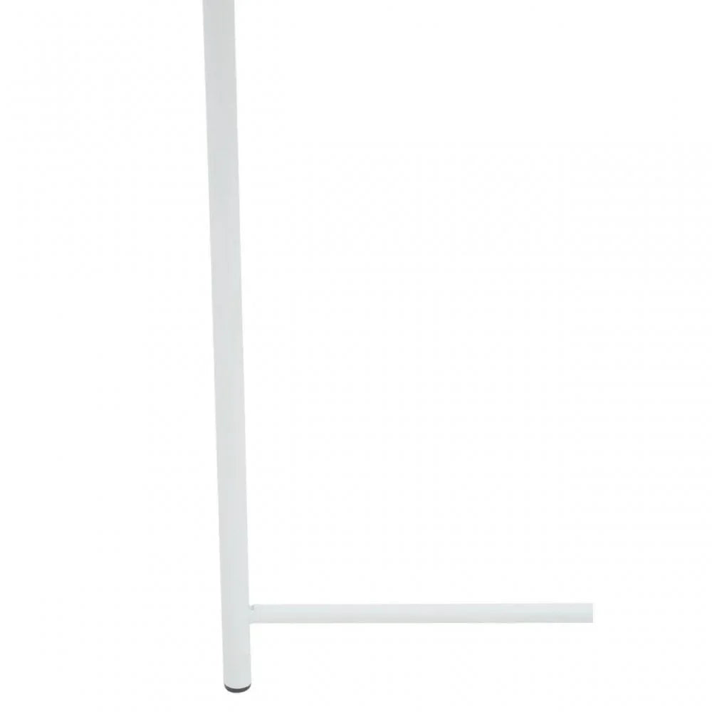 White metal furniture leg with horizontal support in close-up view