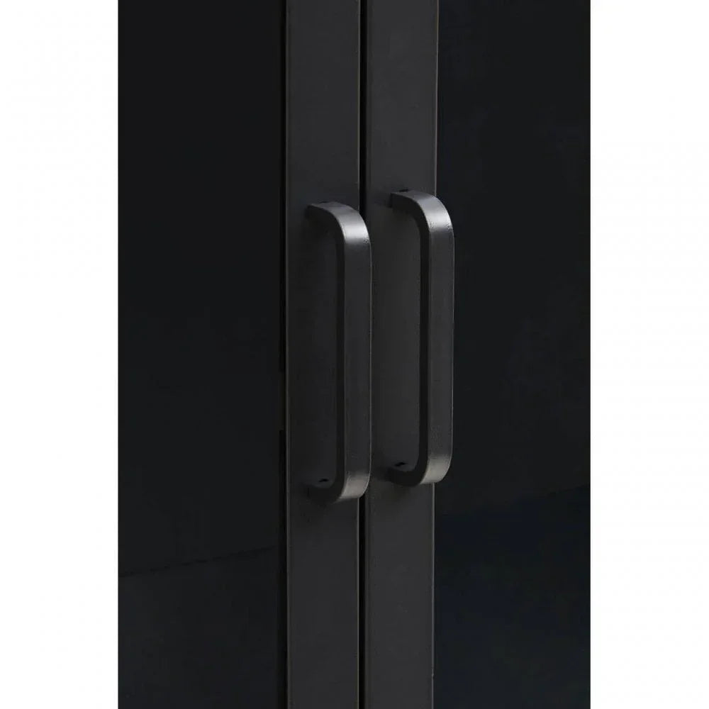 Close up of black cabinet doors with matte black metal handles