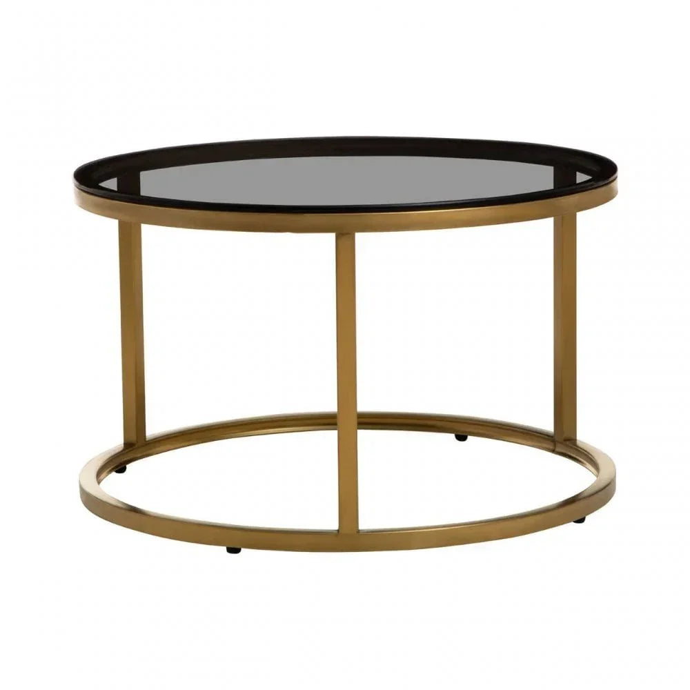 Round glass coffee table with gold metal frame on white background