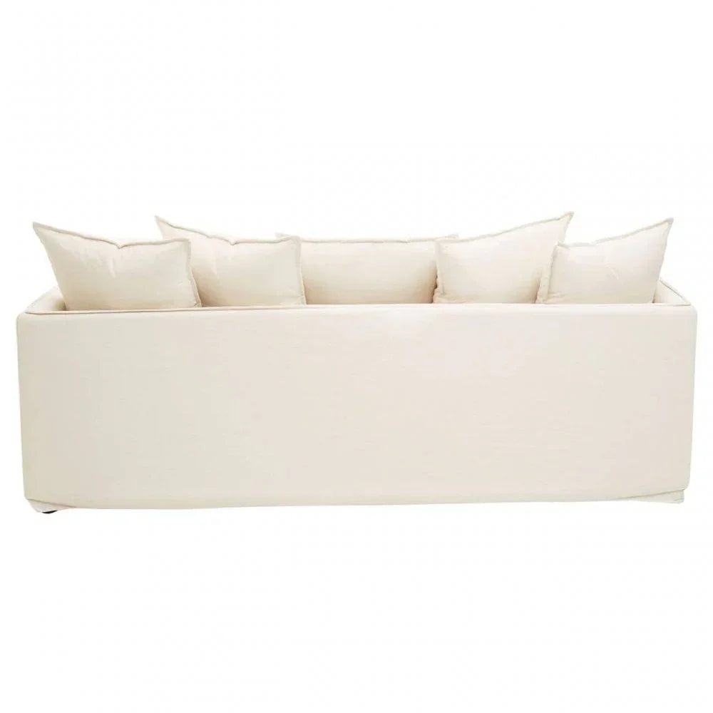 Beige fabric sofa with five matching back cushions, viewed from the back
