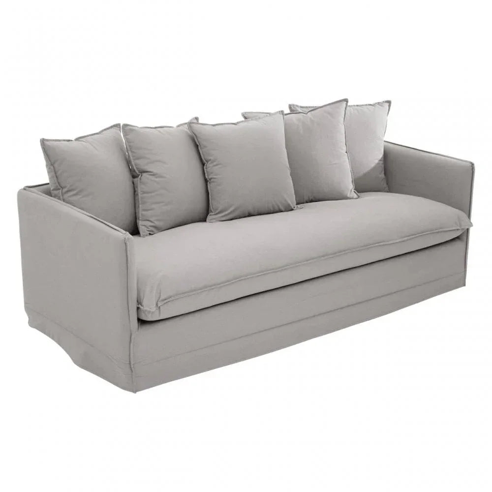 Light grey fabric sofa with five matching scatter cushions and box armrests