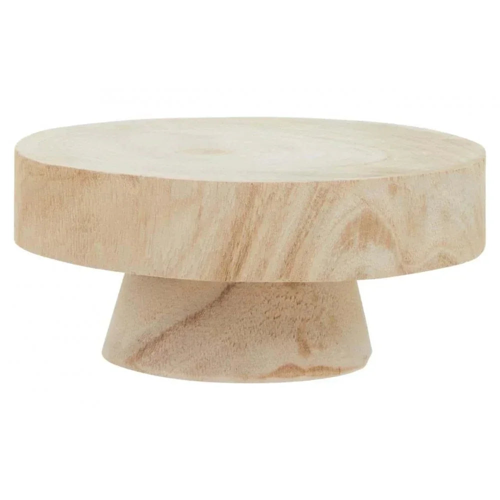Round wooden coffee table with thick top and angled base, natural finish