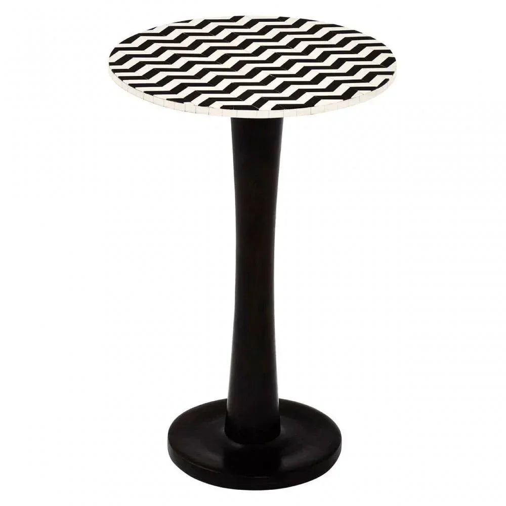 Modern black side table with round zigzag patterned top and pedestal base