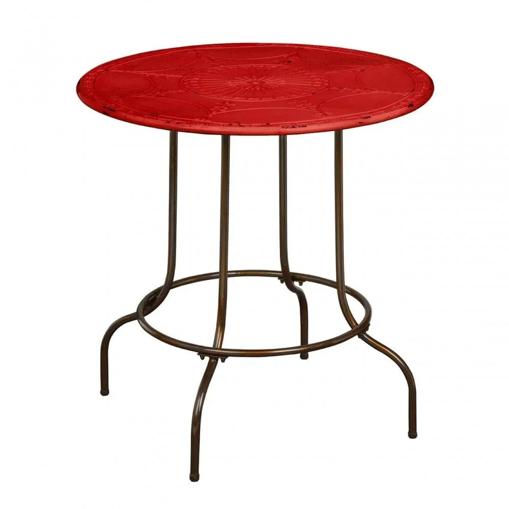 Red metal garden side table with round top and four curved legs