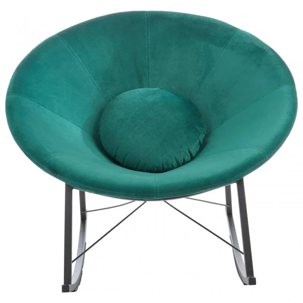 Green velvet accent chair with circular cushion and black metal legs