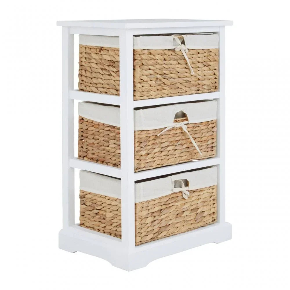 White wooden storage unit with three wicker basket drawers and fabric liners