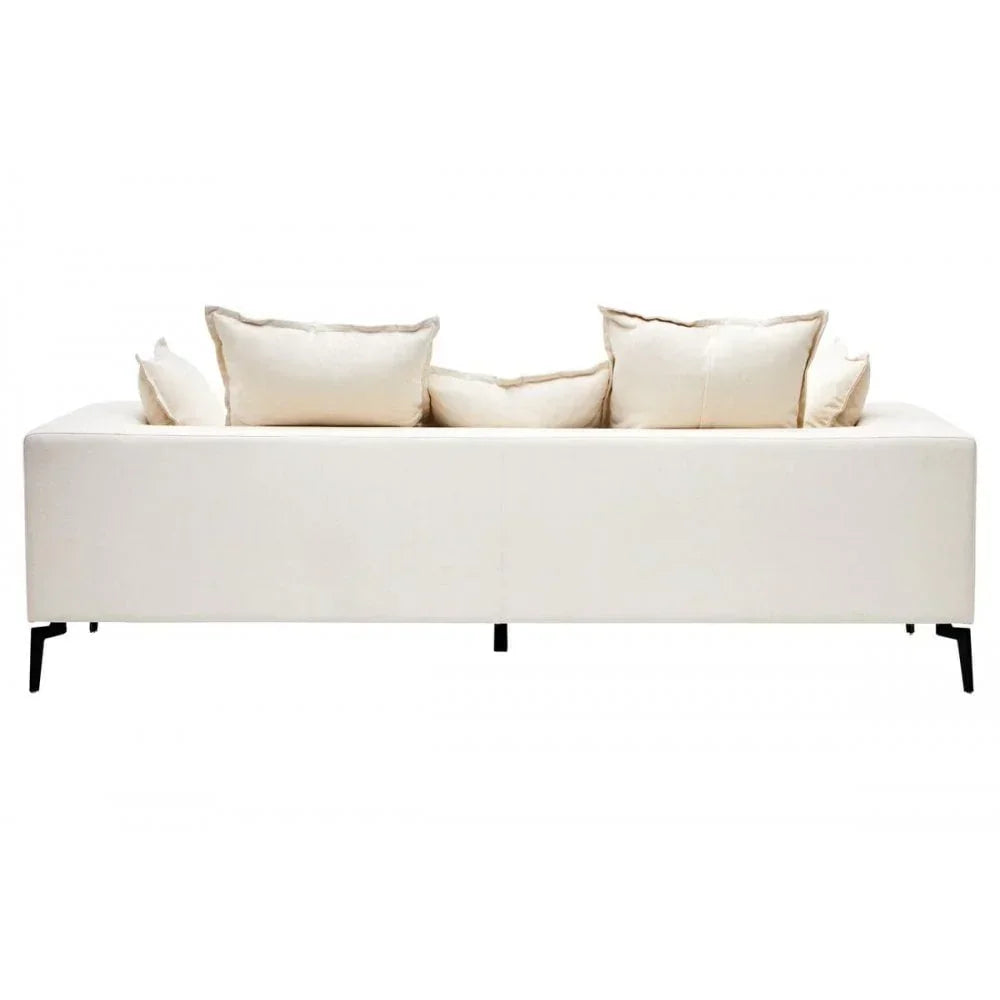 cream fabric sofa with five matching cushions and slim black legs, rear view