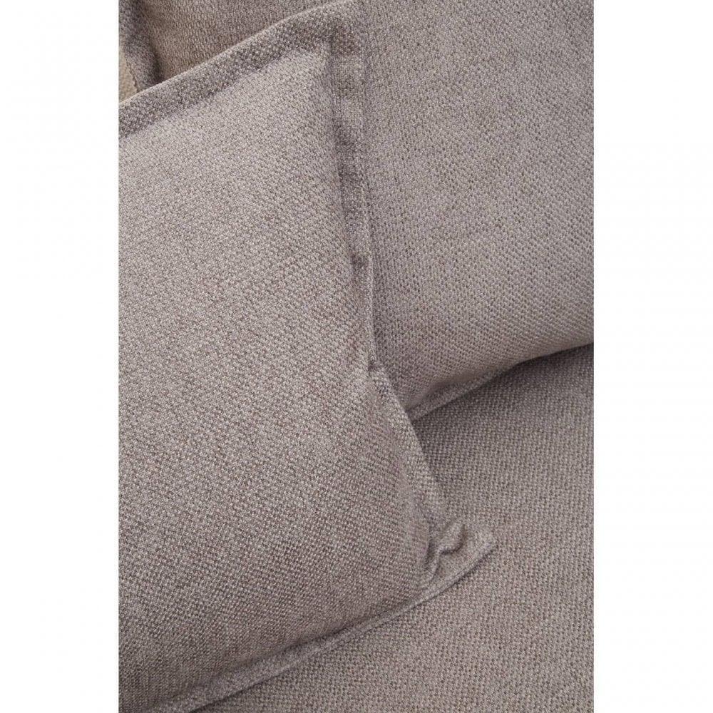 Closeup of textured fabric sofa cushions in light beige colour