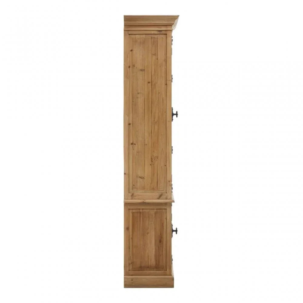 Side view of tall wooden cabinet with paneled doors and metal handles