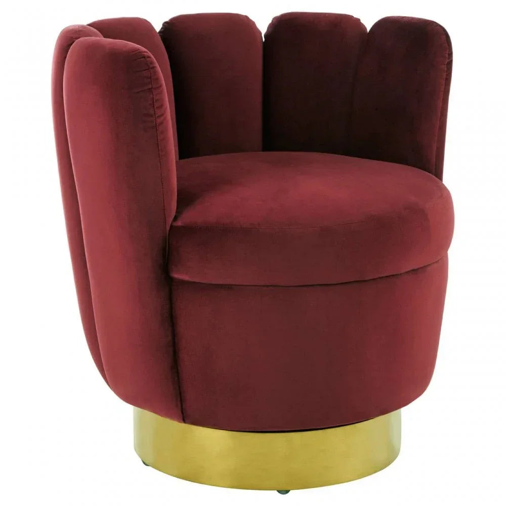 Red velvet accent chair with scalloped backrest and gold base