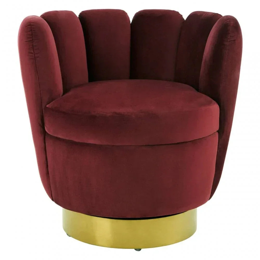 Burgundy velvet accent chair with rounded backrest and gold metal base