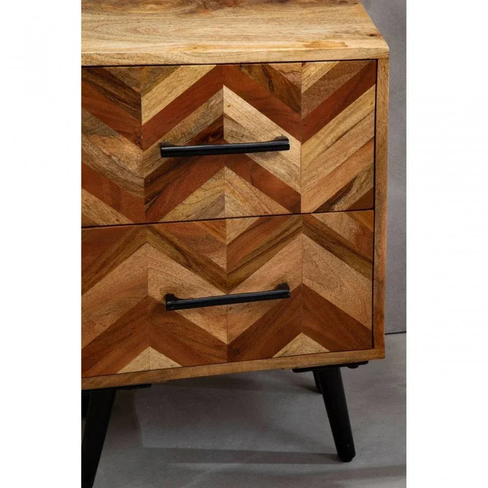 Wooden chest of drawers with chevron pattern and black handles, angled modern legs