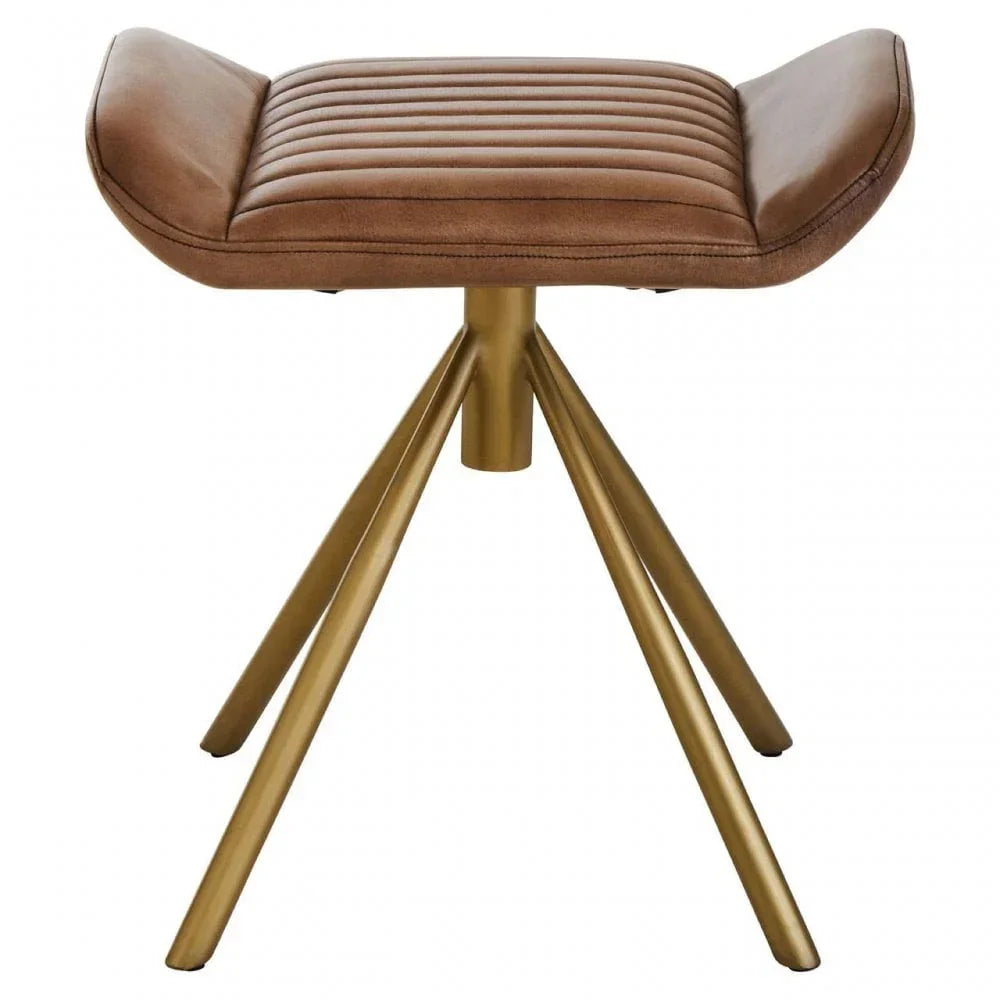 Brown leather footstool with gold metal tripod legs and horizontal stitched seat