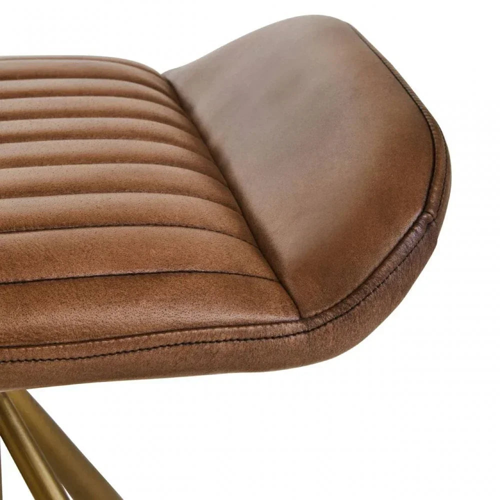 Close-up of brown faux leather bar stool seat with stitched ribbed cushion detail