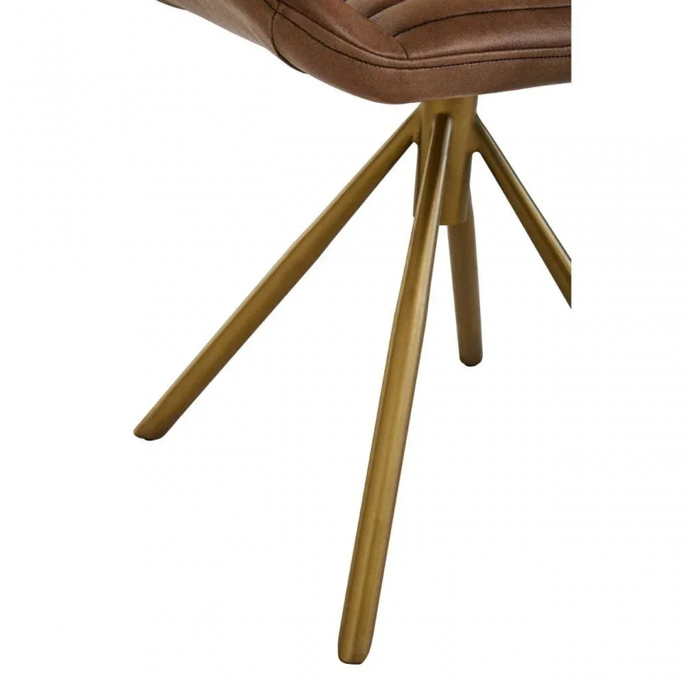 Brown dining chair with gold metal legs, close-up of base and seat edge
