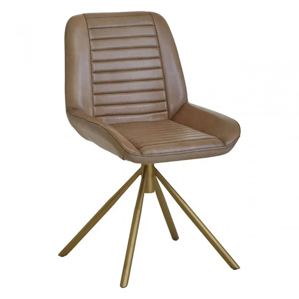 Tan leather dining chair with ribbed seat and gold metal legs on white background