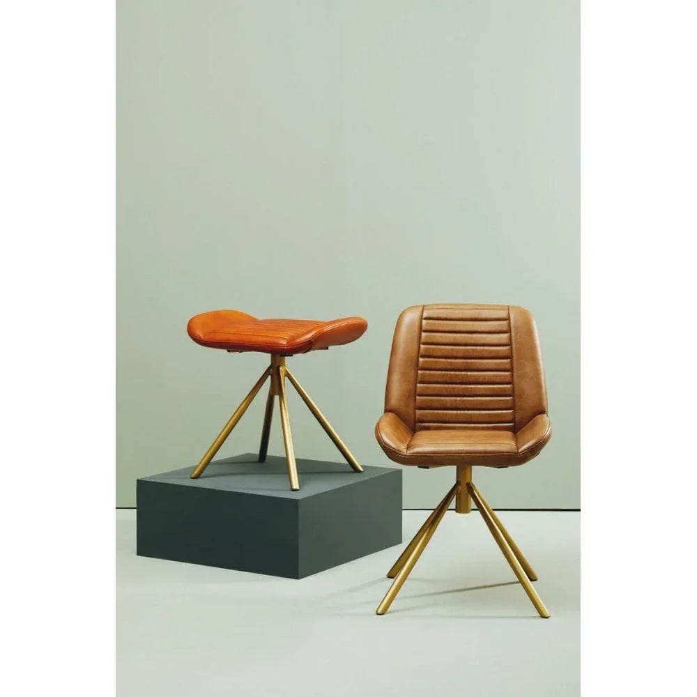 Brown leather dining chair and matching stool with gold metal legs on modern background