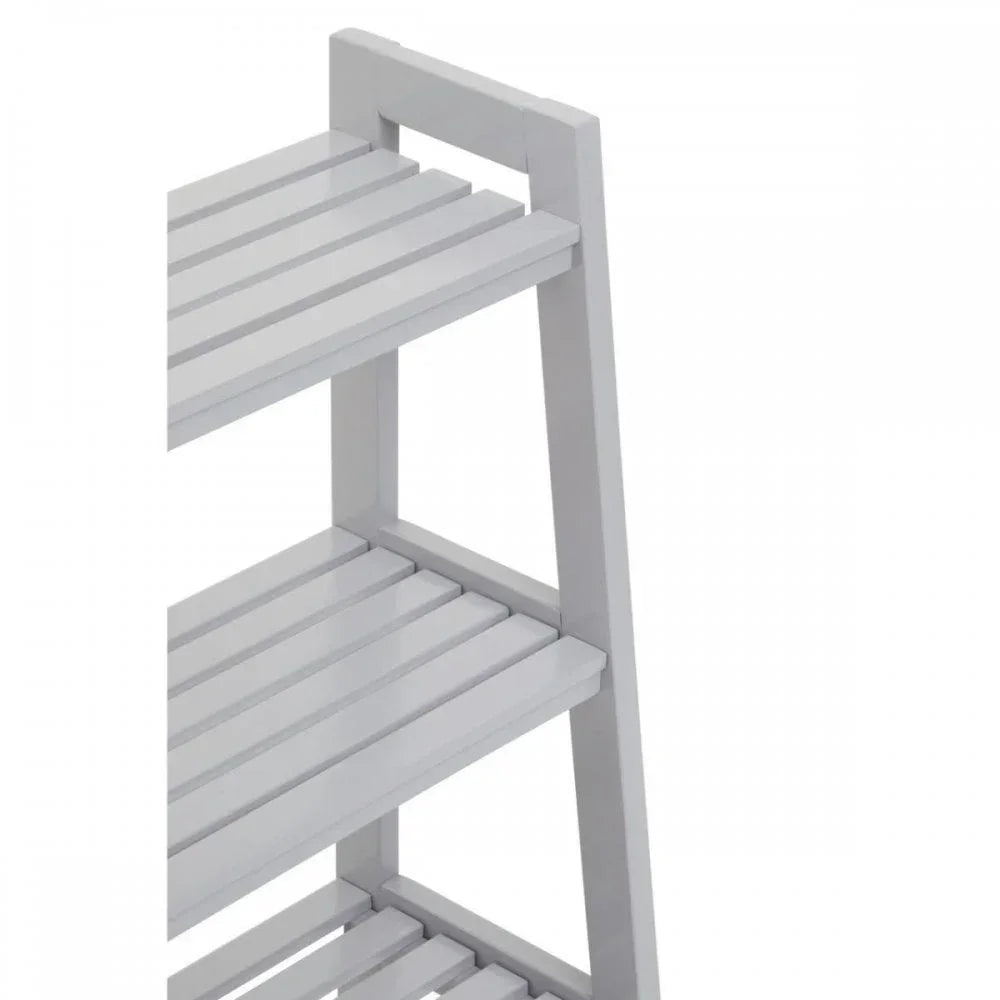 White wooden shelving unit with slatted shelves, angled side view