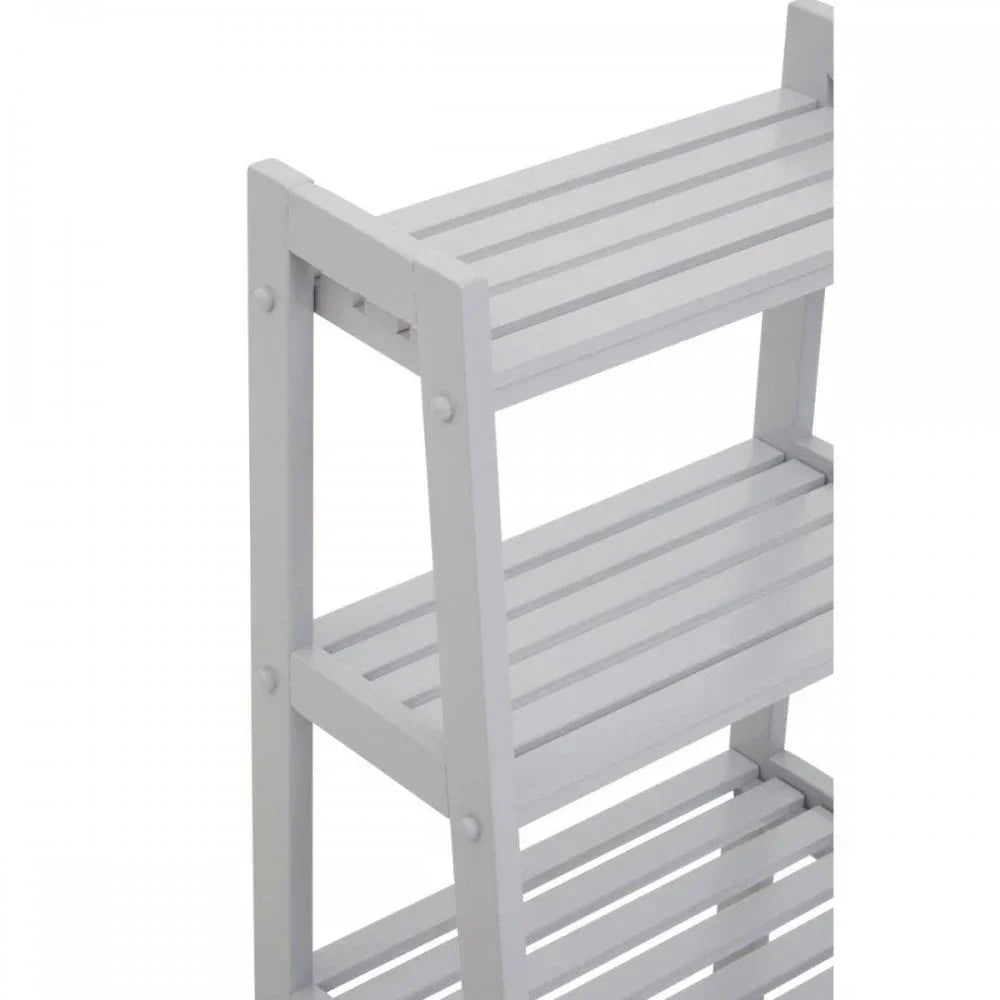 White slatted wooden shelving unit with three tiers, angled side view