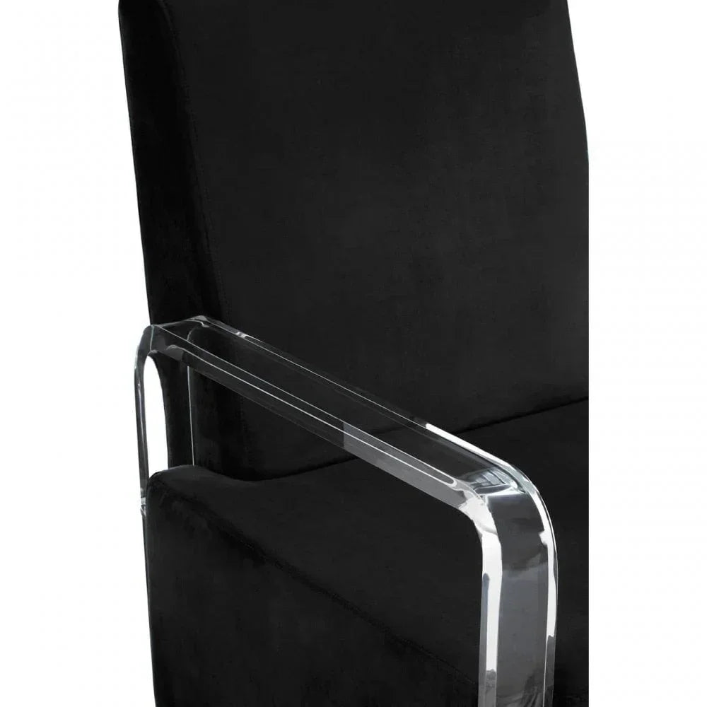 Black upholstered chair with clear acrylic armrest, close-up of side detail