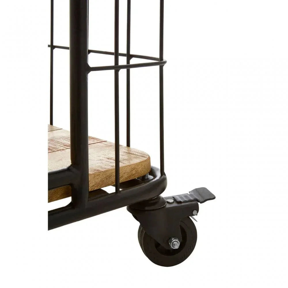 Close-up of furniture trolley wheel with black metal frame and wooden shelf