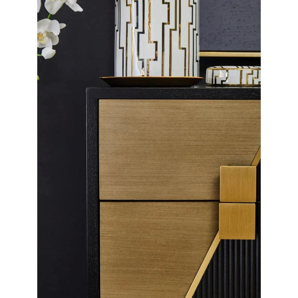Modern brass sideboard corner with gold geometric handles and black trim detail