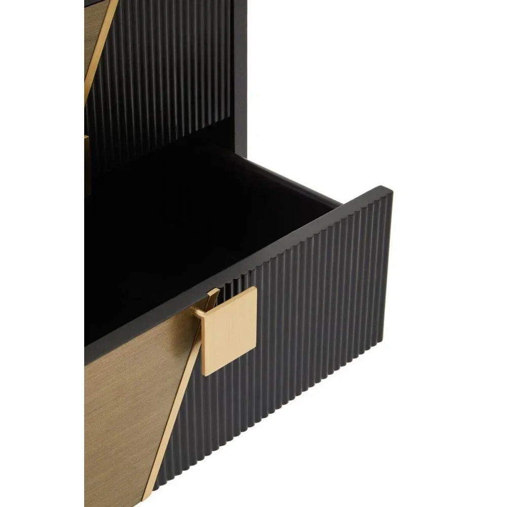 Black and gold bedside table drawer with ribbed finish and square handle partially open