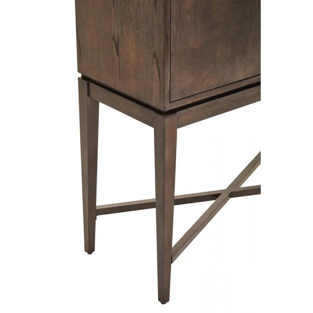 Dark wood cabinet with square legs and cross-brace detail, close view of base