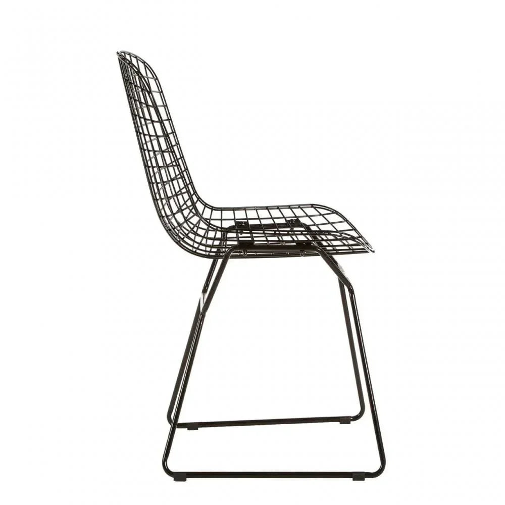 Black metal wire dining chair with sled legs, side view on white background