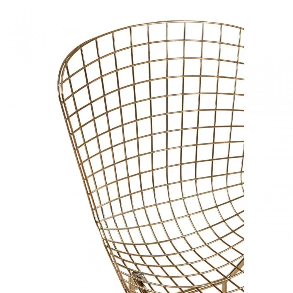 Gold metal wire chair backrest closeup with grid pattern design