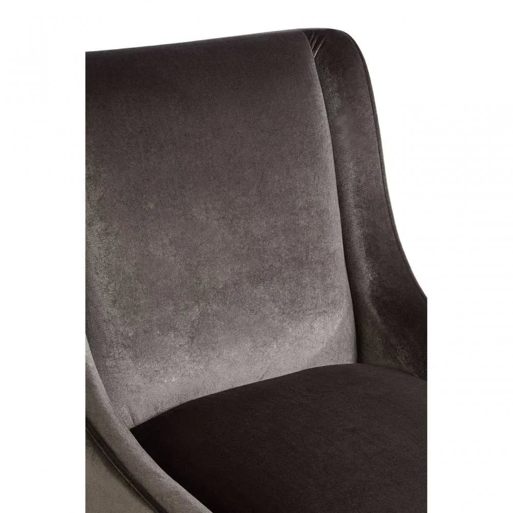 Close-up of grey velvet armchair backrest and seat upholstery