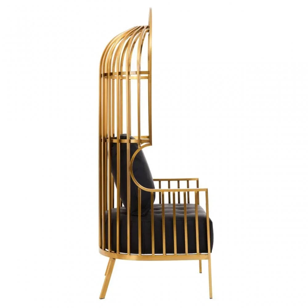 Gold frame accent chair with tall cage-style back and black cushioned seat, side view