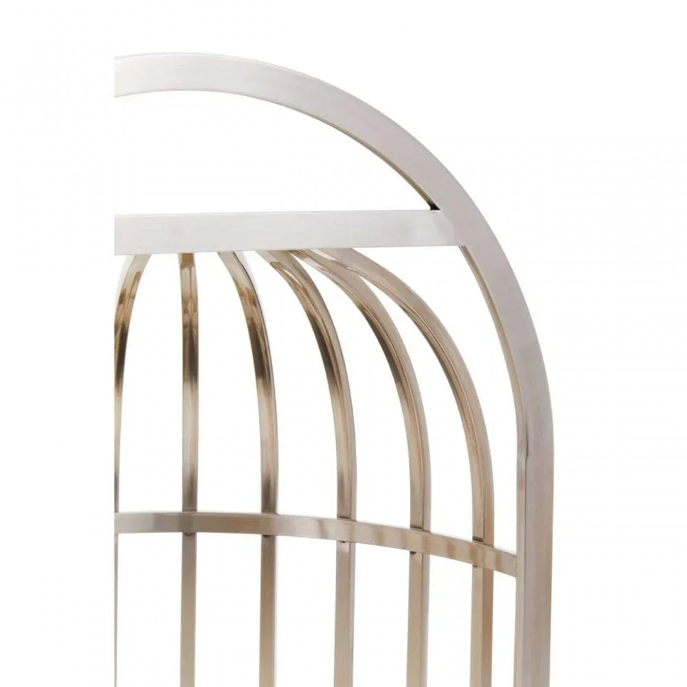 Silver metal bed frame with curved headboard vertical bars closeup
